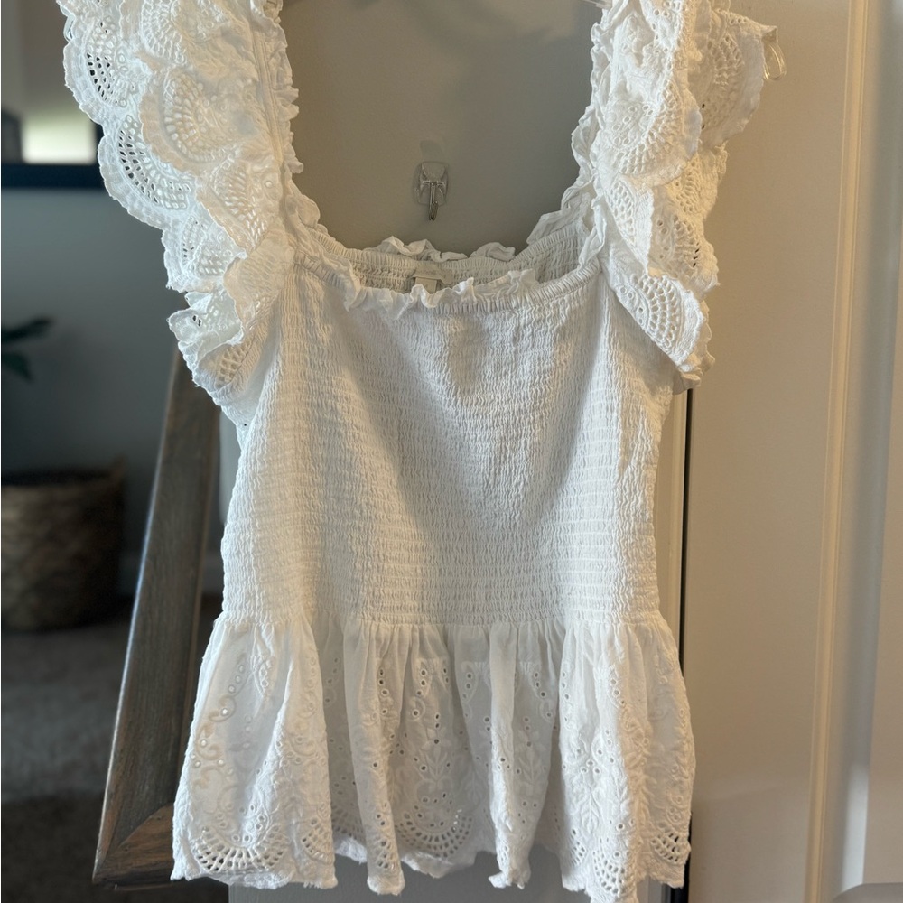 Cream Sleeveless Ruffled Peplum Blouse